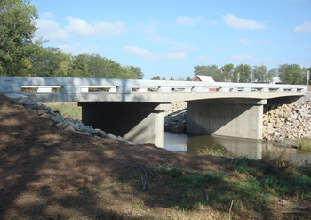 A hauched slab bridge will be replacing the steel truss bridge.